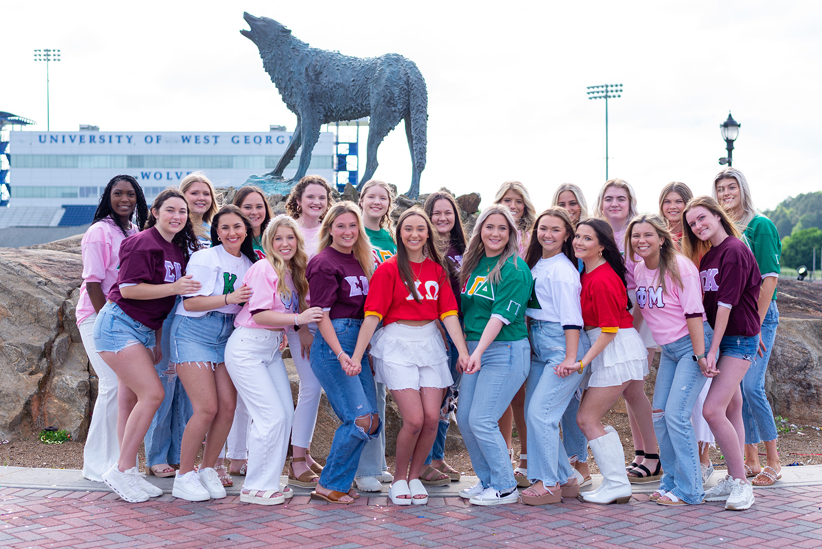 fraternity and sorority students in greek village